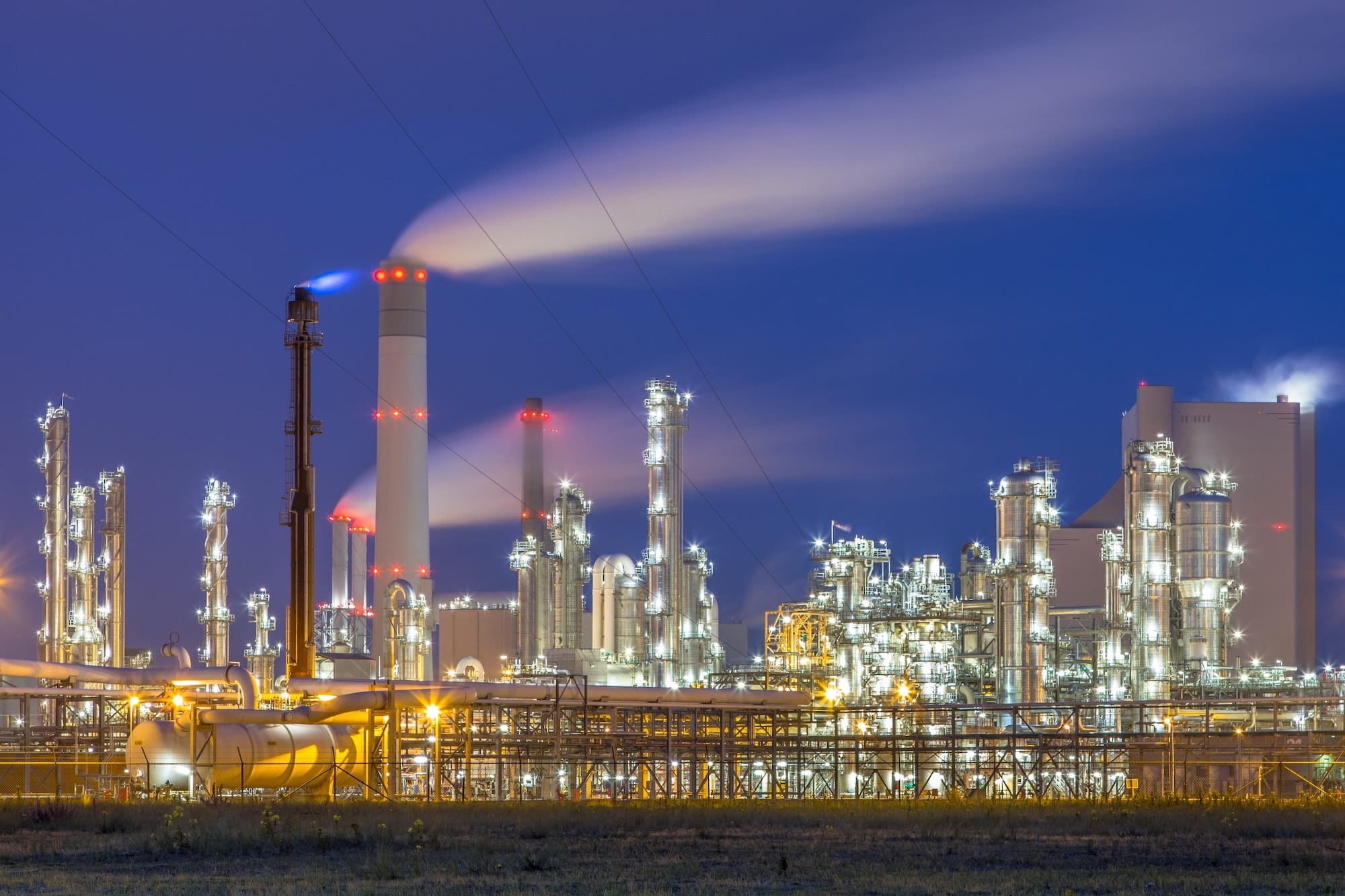 Modern chemical plant at night